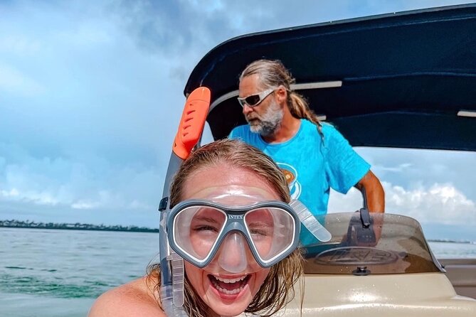 Shell Island Dolphin and Snorkel Boat Tour - Shell Island gives the trip its firmest payoff