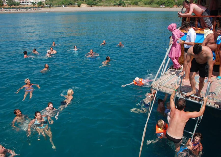 Side: Dolphin Boat Tour With Lunch Foam party Swimming - What the seven-and-a-half-hour schedule feels like