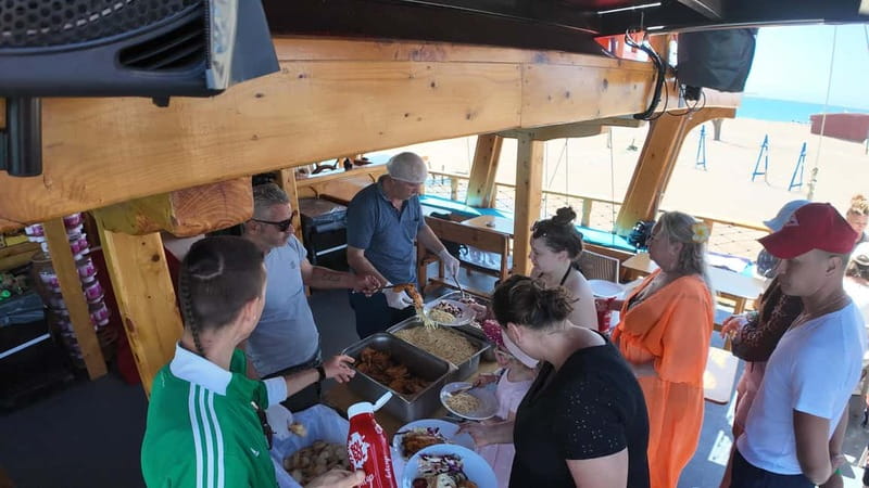 Side: Dolphin Boat Tour With Lunch Foam party Swimming - Who should book this boat day?