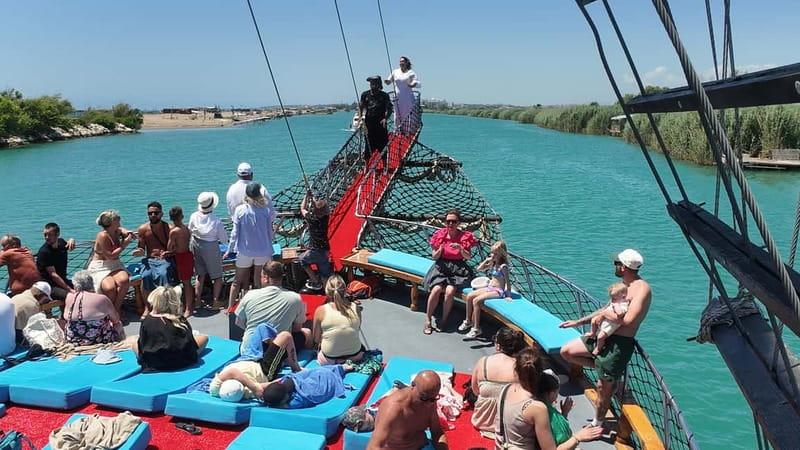 Side: Dolphin Boat Tour With Lunch Foam party Swimming - Three swimming stops, each with a different feel