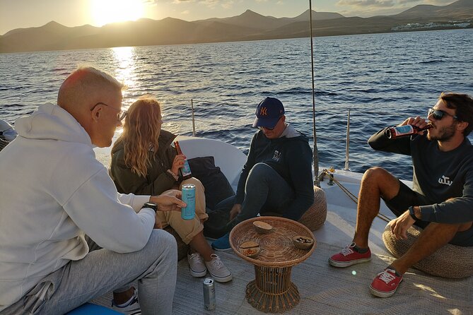 Small Group Dolphin Sunset Tour on Electric Catamaran Lanzarote - Timing, meeting point, and cancellation terms