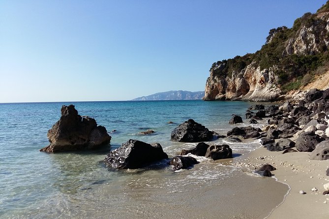 Snorkeling Experience to discover the dolphin inside you! - Entering a Sardinian cave with stalactites