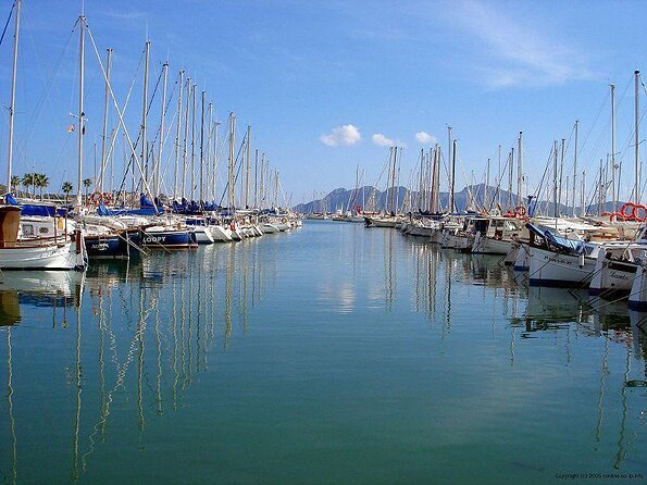 Sunrise Boat Trip in Mallorca with Dolphin-Watching - A pre-dawn start from Port d’Alcúdia
