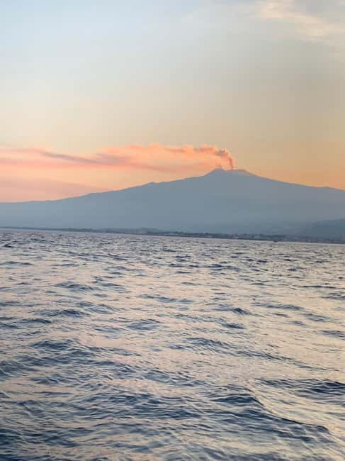 Sunset tour in search of dolphins with aperitif - Starting at Via Vulcano 7 in Giardini Naxos