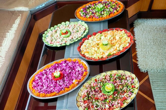 Swim with Dolphin Boat Trip with Snorkeling and Transfer Hurghada - Lunch, drinks, and the banana boat ride