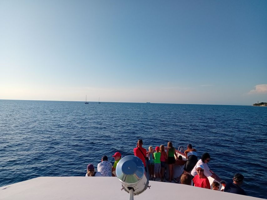 Umag: Sunset Cruise with Dolphin Spotting - Watching Umag change in the sunset
