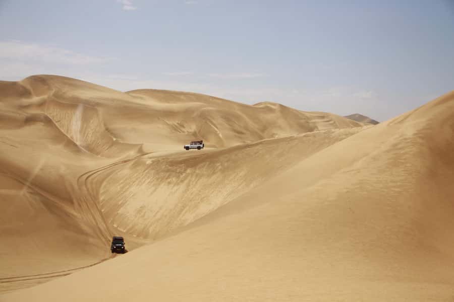 Walvis Bay: Dolphin Cruise, Pink Lakes and 4x4 Dune Drive - Entering Sandwich Harbour by 4x4