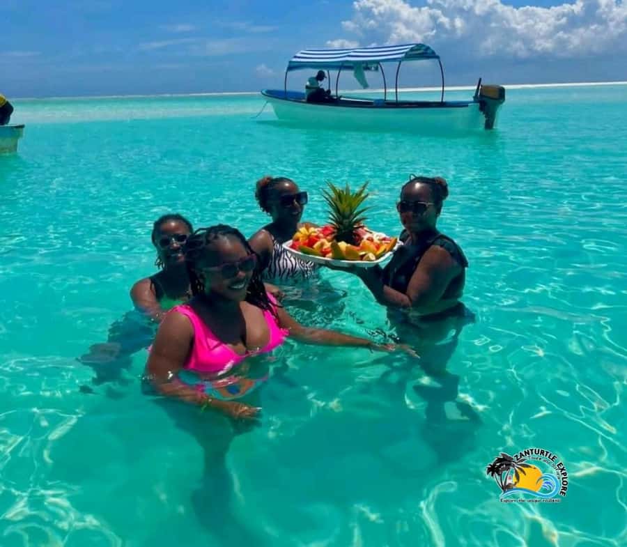 Zanzibar: Mnemba Dolphins Tour with Snorkeling and Sandbank - Languages, timing, and practical preparation