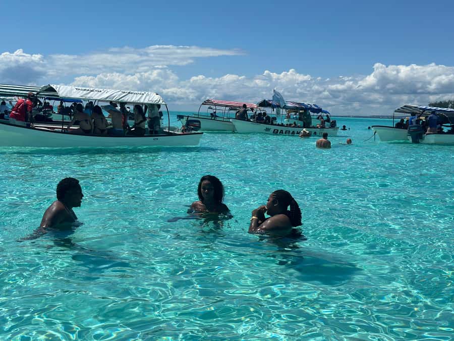 Zanzibar: Mnemba Island Dolphin and Snorkeling Tour - Guides, safety, and the human side of the trip